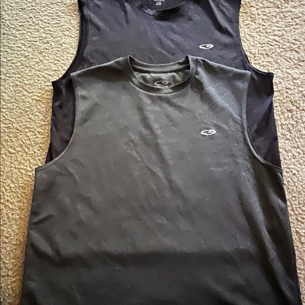 Two men’s large champion sleeveless shirts